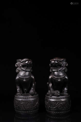 A Pair of Chinese Red Sandalwood Beast Ornaments