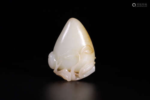 A Chinese Carved Hetian Jade Peach Ornament