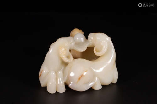 A Chinese Carved Hetian Jade Sheep Ornament