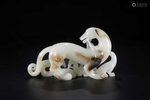 A Chinese Carved Hetian Jade Beast Ornament