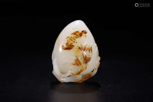 A Chinese Carved Hetian Jade Peach Ornament