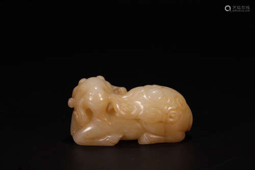 A Chinese Carved Hetian Jade Sheep Ornament