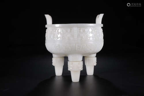 A Chinese Taotie Carved Hetian Jade Three-legged vessel