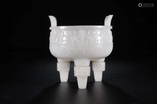 A Chinese Taotie Carved Hetian Jade Three-legged vessel