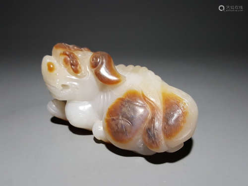 A Chinese Carved Hetian Jade Beast Ornament