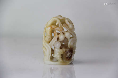 A CHINESE PIERCING HETIAN JADE ROCKERY ORNAMENT