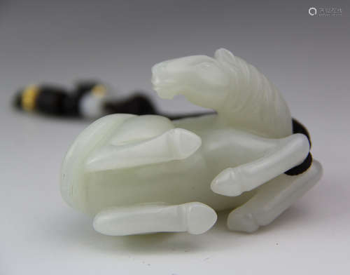 A CHINESE HETIAN JADE HORSE ORNAMENT