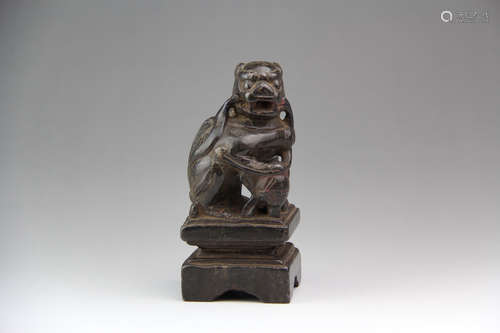 A CHINESE LION CARVED LASURITE PAPER WEIGHT