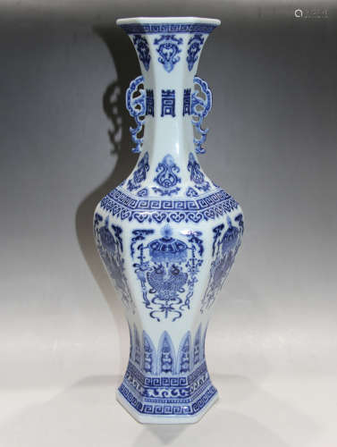 A CHINESE BLUE AND WHITE PORCELAIN ZUN WITH DOUBLE EARS