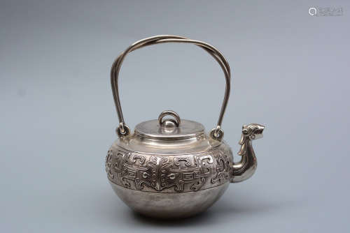 JAPANESE SILVER CAST AND CARVED TEAPOT WITH LIFTING HANDLE