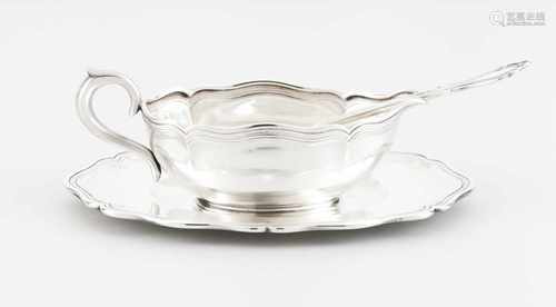 A sauce boat on tray and ladlePortuguese silverPlain body and base of scalloped lip with en