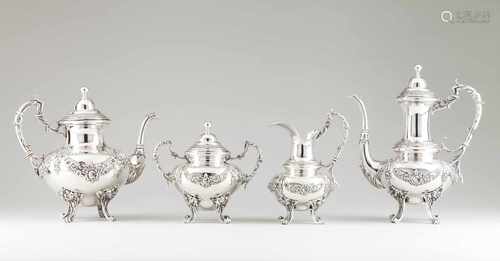 A tea and coffee setPortuguese silverTeapot, coffee pot, milk jug and sugar bowlRaised