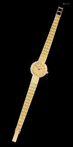 An Omega watchGold 750/000Ladies wrist watch of gold 800/1000 strapGolden face with bat