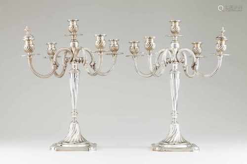 A pair of five branch candelabraPortuguese silverSquare base of straight corners, spiralled