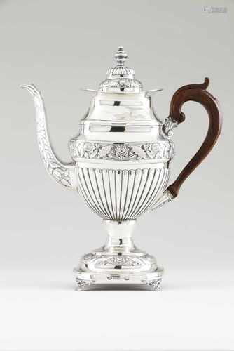 A coffee potPortuguese silver, 19th centuryPart fluted body of raised foliage bandCover