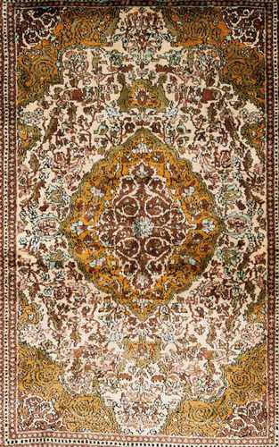 A Srinigard carpet, IndiaSilkFloral decoration in beige, brown, yellow and green132x73