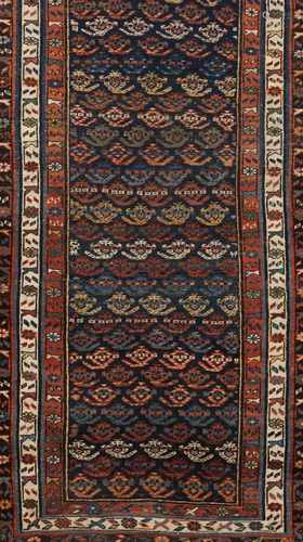 An oriental rugWool and cottonFloral decoration on red, beige, blue and green shades20t