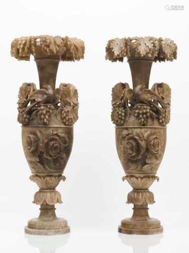 A pair of large vasesAlabasterRaised and pierced decoration with birds, vines and other fol