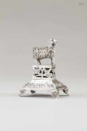 A toothpick holderSilver, 19th/20th centuryA Billy goat sculpture on a pierced and engraved