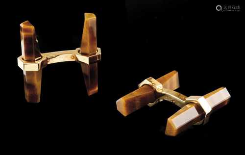 A pair of Cartier cufflinksGoldFaceted tiger's eye cross bars French assay marks 750/10