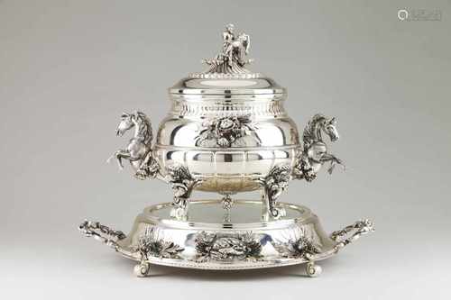 A centrepieceNickel silverLarge tureen with cover and tray entirely decorated with motifs a