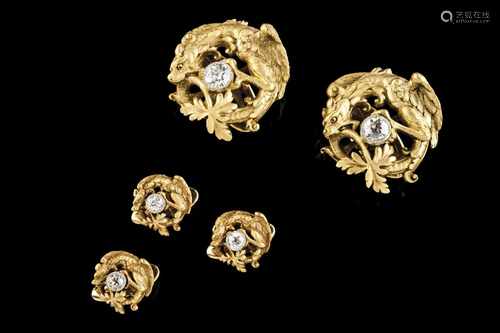 A set of five button studsGoldCarved dragon holding white coloured antique brilliant cut di