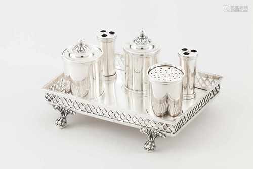 An inkwellPortuguese silverPlain tray of pierced gallery, two wells, two quill trays and a