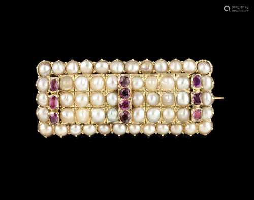 A broochGoldSet with half pearls, small tourmalines and rubiesEurope, circa 1940Unm