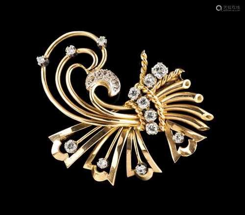 A broochGold 750/1000Stylised branch set with 18 brilliant cut diamonds totalling (ca.1.00c