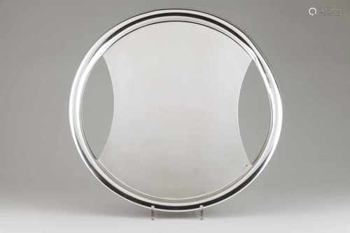 A modernistic trayPortuguese silverPlain circular base of fluted border and scalloped handl