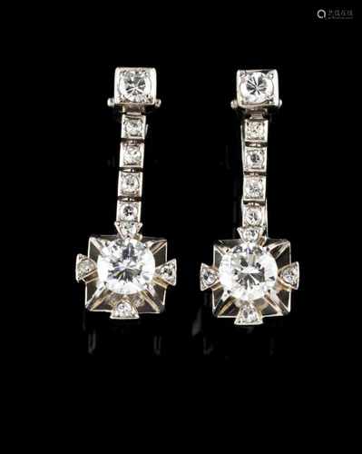 A pair of drop earringsGoldSet with 4 brilliant cut diamonds, two totalling (ca.0.50ct) and