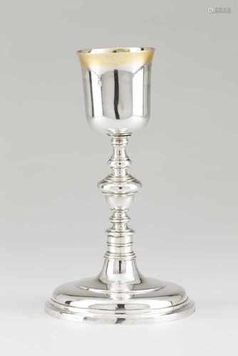 A chaliceWhite and gilt silverTurned bodyPossibly Spanish, 18th centuryHeight: 25,5