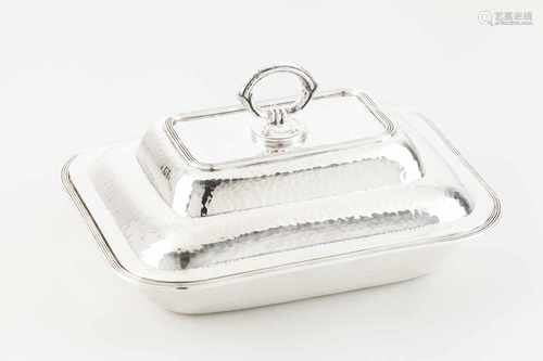 A vegetable dishPortuguese silverRectangular shaped of hammered base and cover with frieze