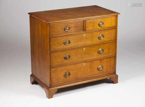 A George III chest of drawersOakTwo short and three long drawers, bone lock escutcheons