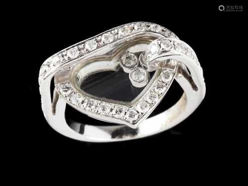 A Chopard ringGold, Happy Diamonds collectionHeart shaped with 3 loose brilliant cut diamo