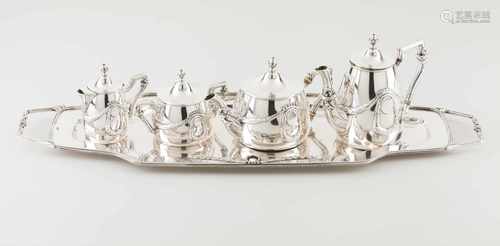 A tea and coffee set with trayPortuguese silverRomantic era decoration of bows, ribbons and