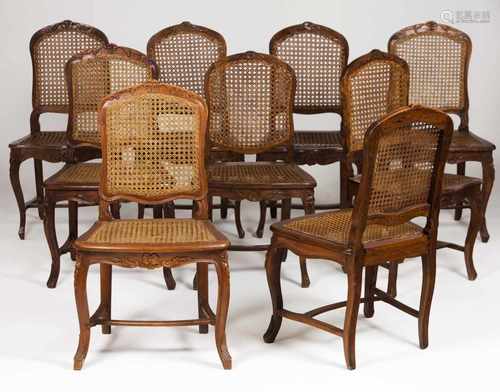 A D.Maria nine chair setWalnutCarved decorationCaned backs and seats(signs of wear