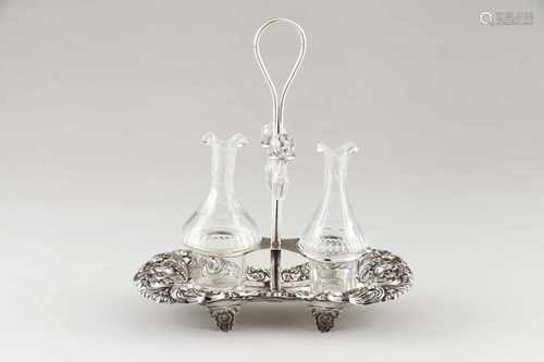 A cruet setPortuguese silver, 19th centuryPlain base with pierced and repoussé flower a