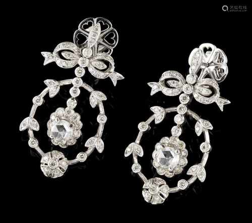 A pair of earringsGoldRomantic era decoration of bow and leaves set with small diamonds and