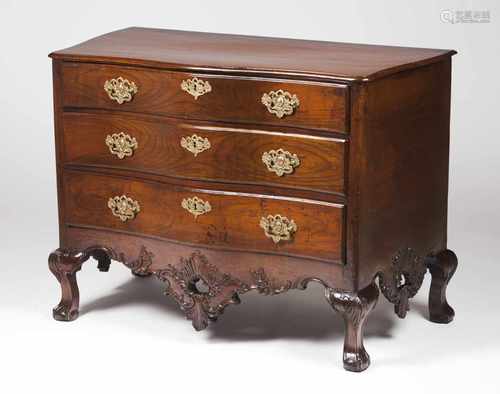 A D.João V chest of drawersWalnutBrazilian mahogany top, three drawers and scalloped and ca