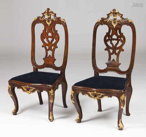 A pair of D.José chairsWalnutCarved and part gilt crest, apron and legsScalloped and pi