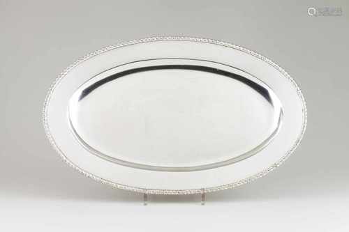 An oval serving dishPortuguese silverPalin base of gadrooned friezeLisbon hallmark, Eag