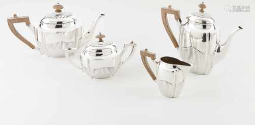 A tea and coffee setPortuguese silverPart fluted body with straight wooden handles and carv