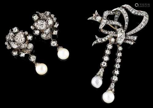 A brooch and pair of earrings setSilver and goldA bow with ribbons fully set with antique b