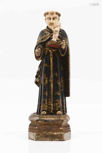 Saint Anthony and The Child JesusCarved, gilt and polychrome wooden sculptureIvory head, ha