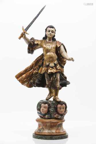 The Archangel Saint MichaelCarved, gilt and polychrome wooden sculptureDepicting the Archan