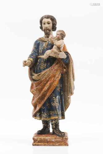 A Saint Joseph and The Child JesusCarved, polychrome and gilt wooden sculptureOn a marbled