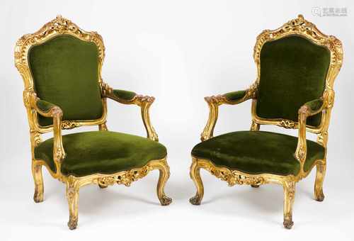 A pair of Napoleon III armchairsCarved and gilt wood with flowers, foliage and shell motifs