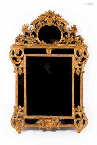 A Régence mirrorGilt wood and gesso frameFloral decorationFrance, 18th century(mino