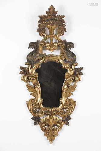 A wall mirrorCarved and gilt wooden framefloral and birds decoration to crestSpain, 18t